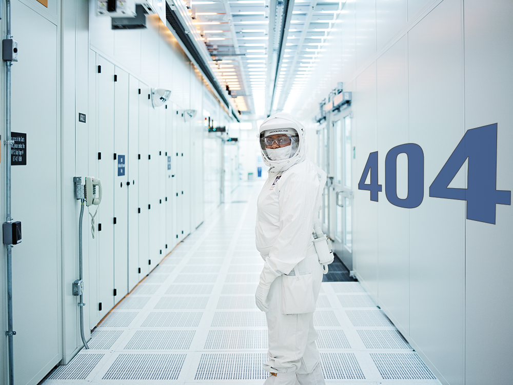 Image of Intel employee in a bunny suite at a fab.
